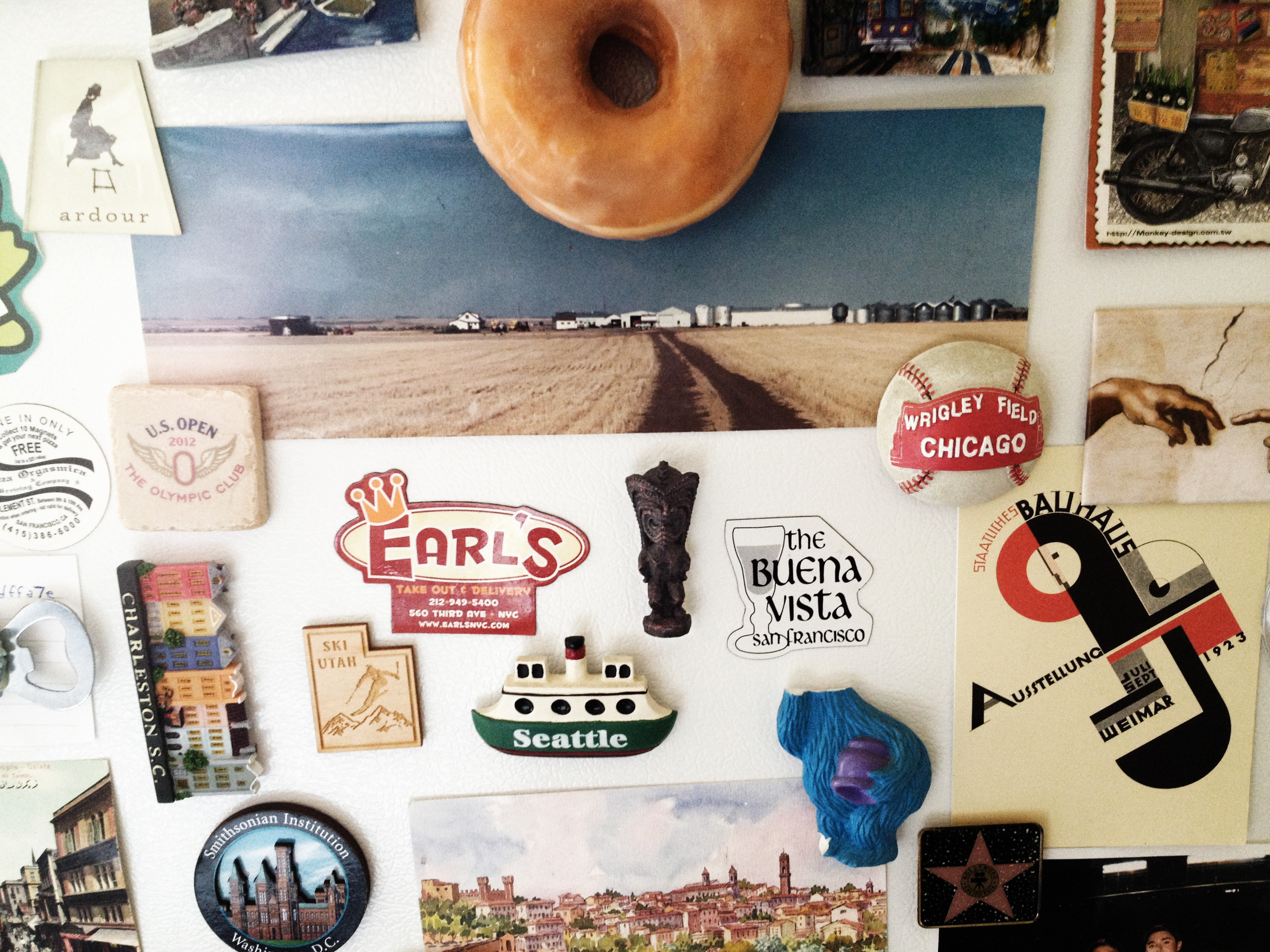 Fridge magnets from places lived, visited, and loved